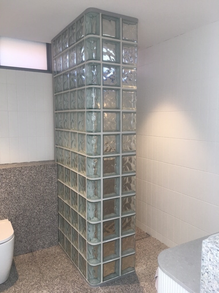 Glass block shower screen in a residential bathroom